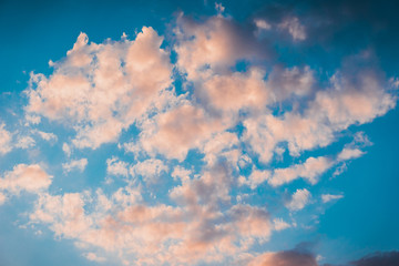 blue sky with orange clouds