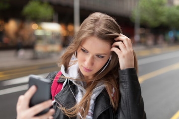 girl  listening to music and take selfie