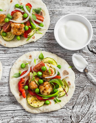 Tortilla with chicken meatballs and grilled vegetables. Healthy delicious food