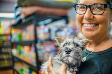 Woman holding puppy