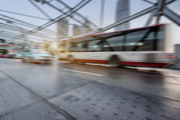 Fototapeta na wymiar motion blurred traffic at steel bridge