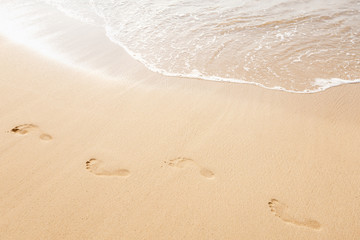 Footsteps on the beach.