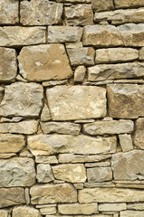 Fototapeta premium Old stone wall closeup