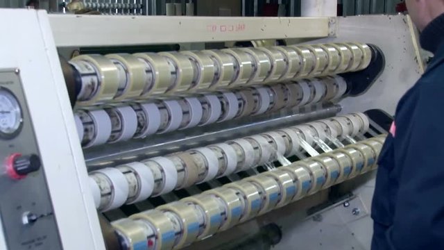 Winding tape with adhesive application rolls 3