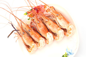 shrimp boil orange in plate isolated on white background.