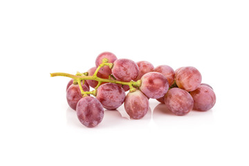 Red grapes isolated on white background.