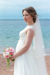 Fototapeta na wymiar Attractive bride in wedding day