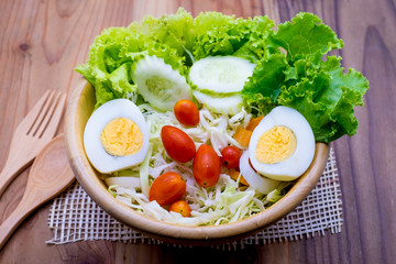 salad in a wood bowl