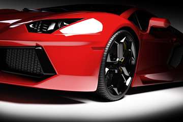 Obraz na płótnie Canvas Red fast sports car in spotlight, black background. Shiny, new, luxurious.