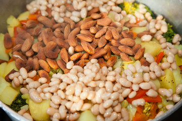 Closeup of sabzi with almonds and beans