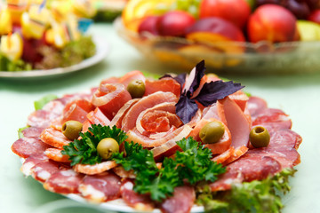 Dish with sliced meat products