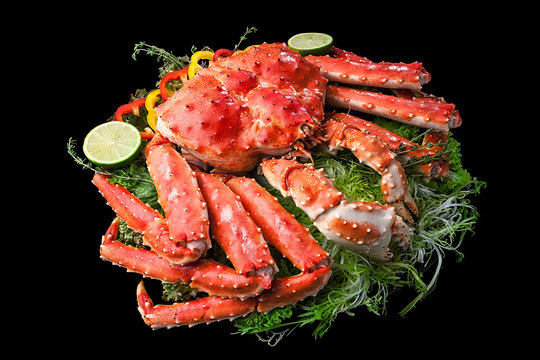 Top view of Red king crab served on black background