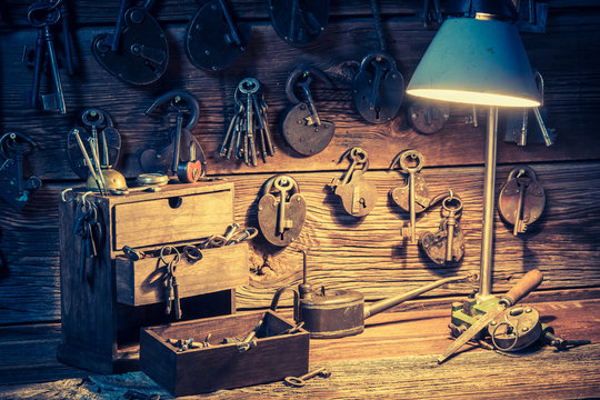 Tools, locks and keys in small locksmiths workshop