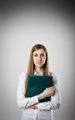 Woman in white is holding a folder.