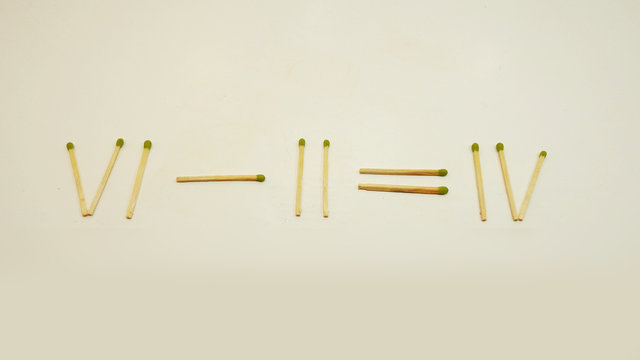 Abstract equation using matches.