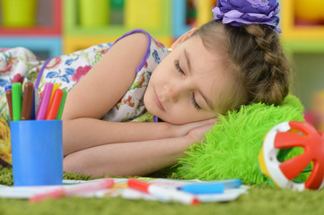 student girl sleeping  at art class