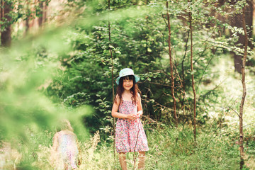 Fototapeta na wymiar Child in forest.