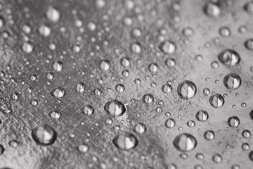 Drops on a gold background , shallow depth of field