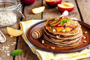Pancake with poppy seeds and peaches