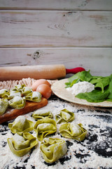 Homemade green pasta ravioli with spinach and ricotta cheese