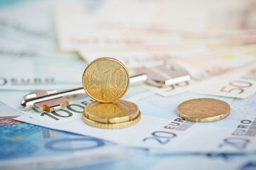 Euro money: closeup of banknotes and coins