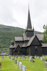 Fototapeta na wymiar Old stave church in Lom, Norway. The church Lom Kyrkje dates from the 12th century.