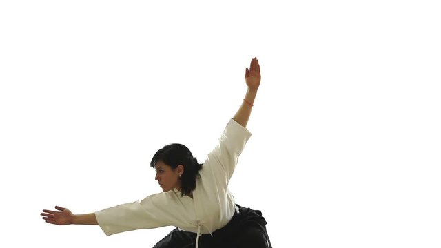 beautiful woman holds a kung fu