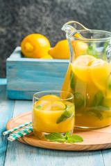 Lemonade in the jug and glass