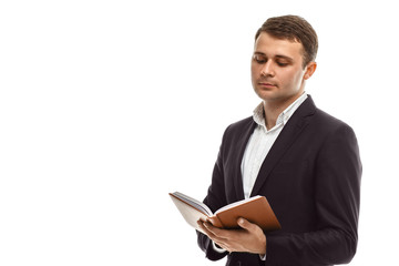 Handsome businessman with diary