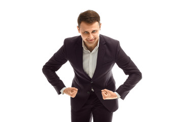 Handsome businessman shows strength