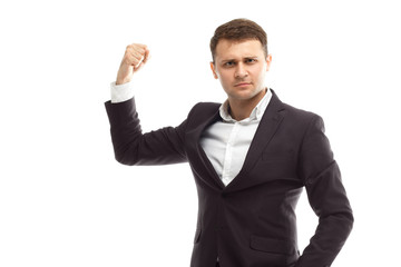 Handsome businessman shows biceps
