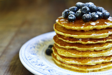 Pancakes with honey and blueberry.Top view.