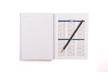 blank notebook and calendar