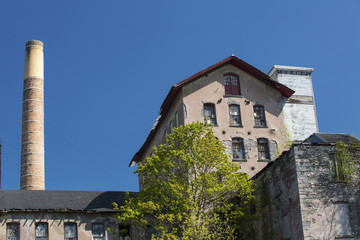 Historic 19th century Dart's Stone Mill on the Hockanum River in Rockville, Connecticut.