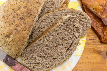 Home baked brown bread slices on the table