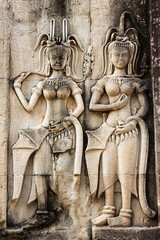 Apsara sculpture on the wall of Angkor Wat, Seam Reap, Cambodia.