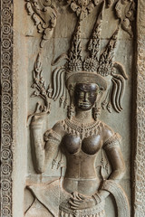 Apsara sculpture on the wall of Angkor Wat, Seam Reap, Cambodia.