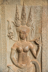Apsara sculpture on the wall of Angkor Wat, Seam Reap, Cambodia.