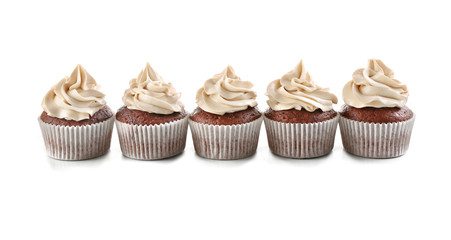 Tasty chocolate cupcakes, isolated on white
