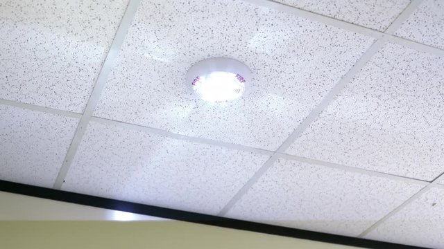 Fire strobe in an modern office building flashing 4k