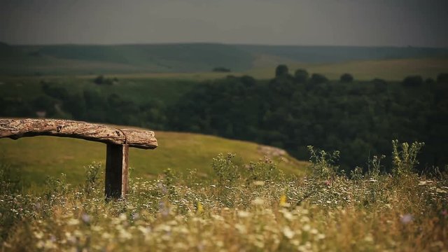 Essentuki Kislovodsk Russia. Panorama of summer field in mountains covered by greenery. Landscape. Fence. Nature.