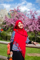 Muslim woman from Indonesia travel to an amusement park in Canada