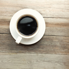 Coffee cup on wooden table