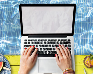 Female Hands Typing Macbook Poolside Concept