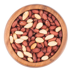 Peanuts in a bowl on a white background.