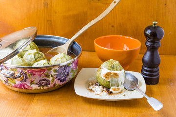 Stuffed round courgettes