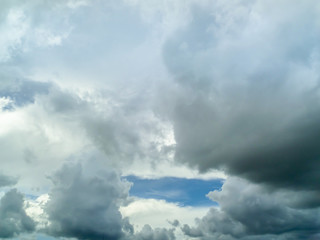 dark cloudscape and light blue sky background