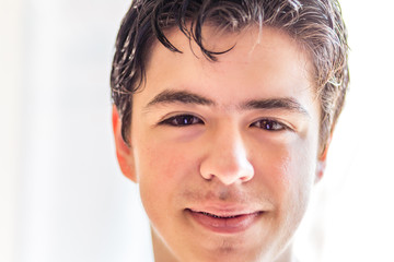 Naklejka premium close up of face of young teen boy