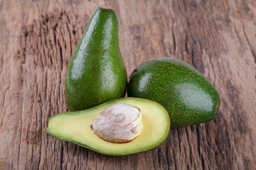 Avocado on a wooden background