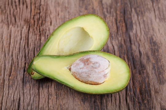 Avocado on a wooden background
